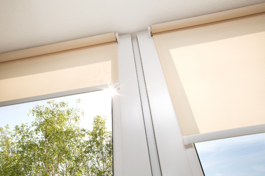 Outdoor shades lowering to shield the bright sunshine.